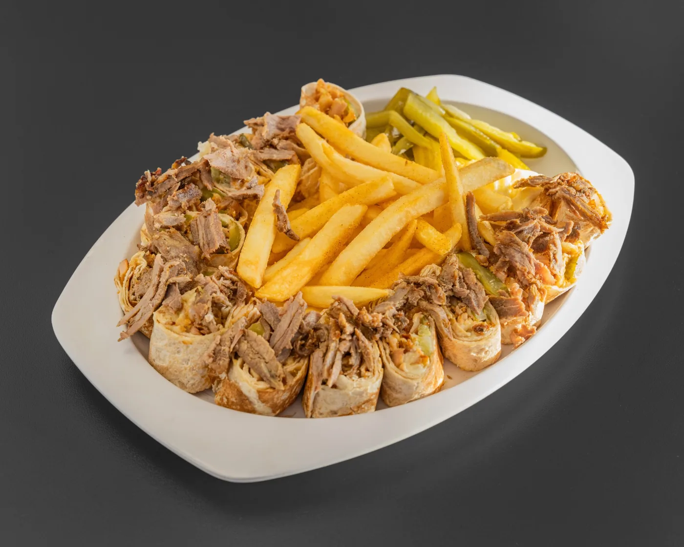 Arabi mixed shawarma platter with fries and pickles