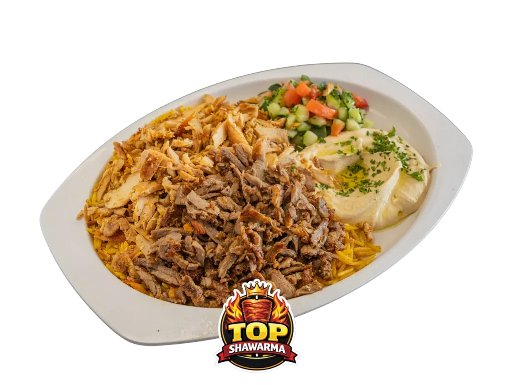 Mixed shawarma plate with rice, hummus, and salad